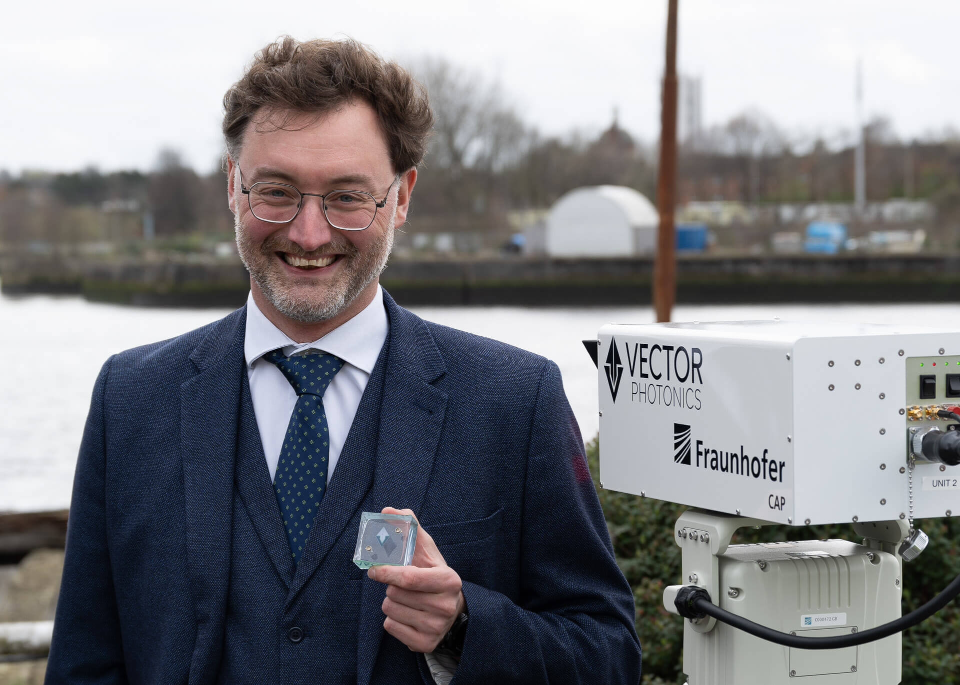 Dr Richard Taylor, CEO and Founder of Vector Photonics, with the PCSEL and optical communications system at the successful demo across the Clyde.